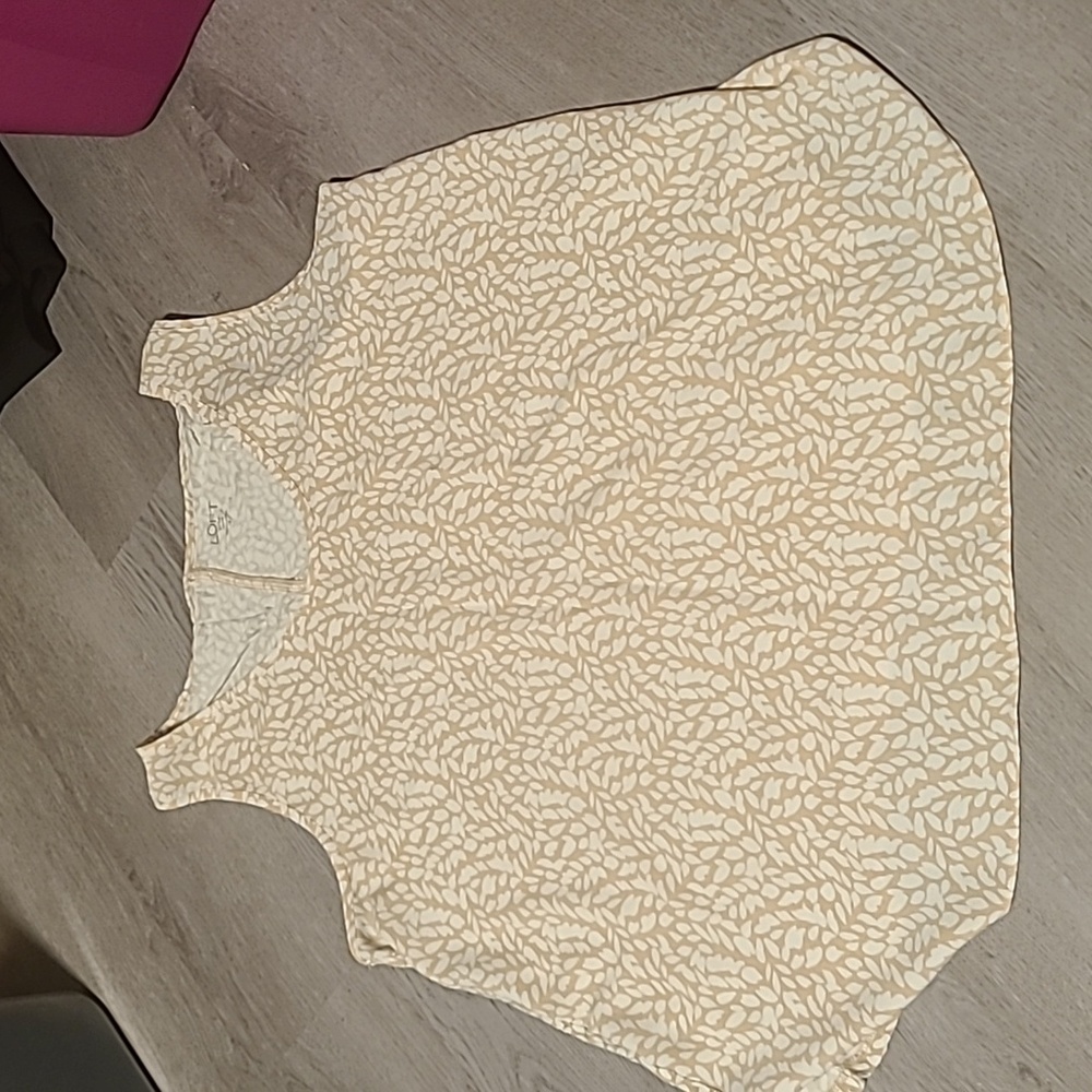 A2. Tan and white patterned tank size L